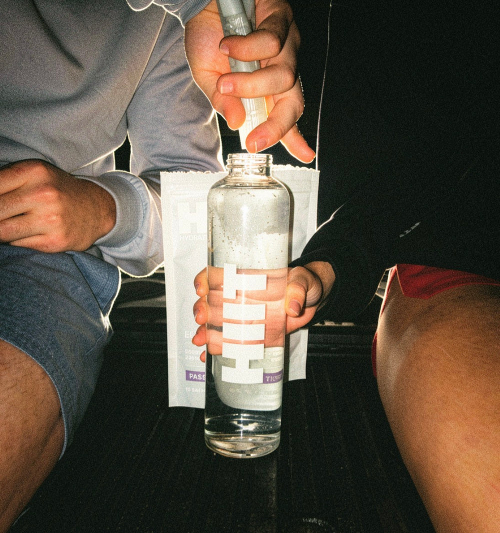 HIIT bottle and sachet, lifestyle